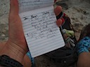 Signing the register.